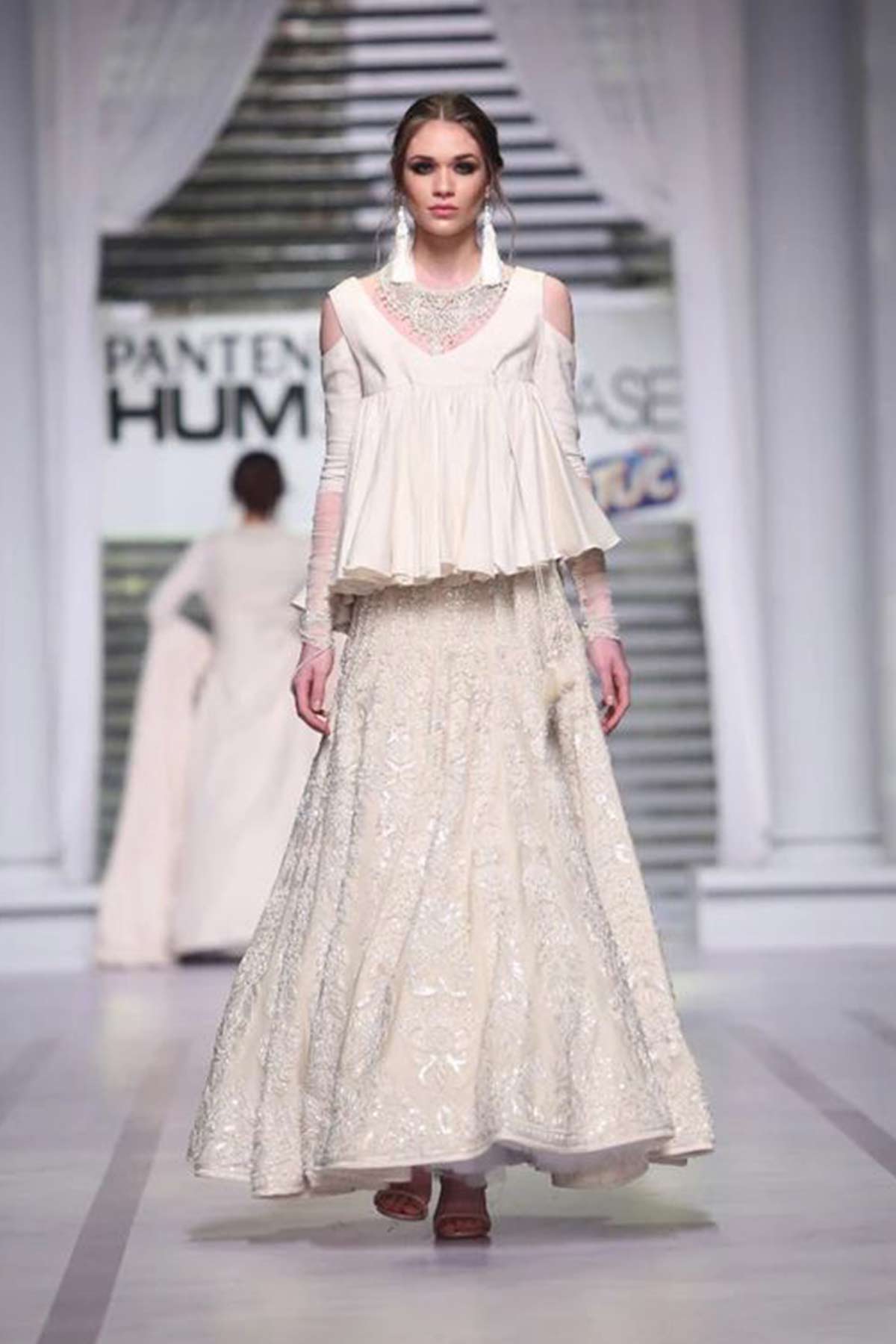 PLEATED SLEEVELESS SHORT TOP WITH PANELED LEHENGA Rizwan Beyg